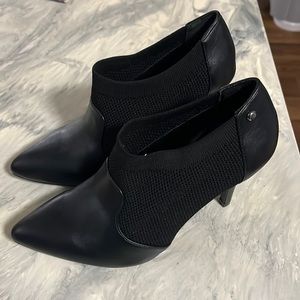 Vera Wang ankle boots. Sexy. Stylish. Never worn. In like new condition. Black
